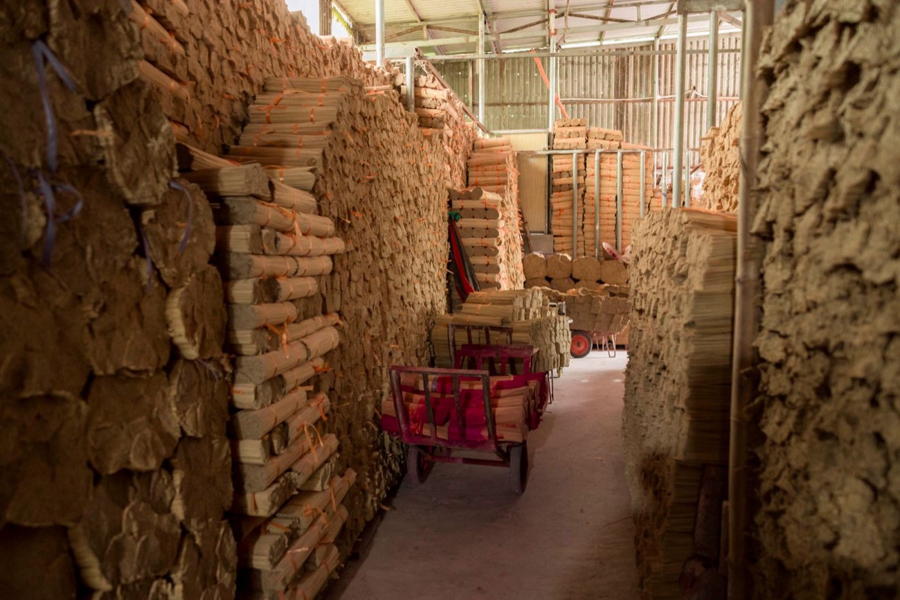 Recovered kraft paper bundles stacked in storage